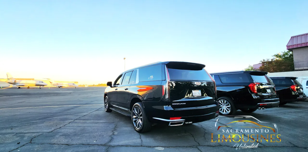 2 Premium full size Luxury Suvs, and a Standard full size Luxury SUV waiting to do a tarmac meet and greet at Modern Aviation at the Sacramento Executive Airport (SAC)